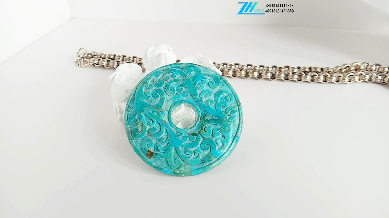 令人敬畏的綠松石雕刻裸寶石圓形 59 毫米 9
