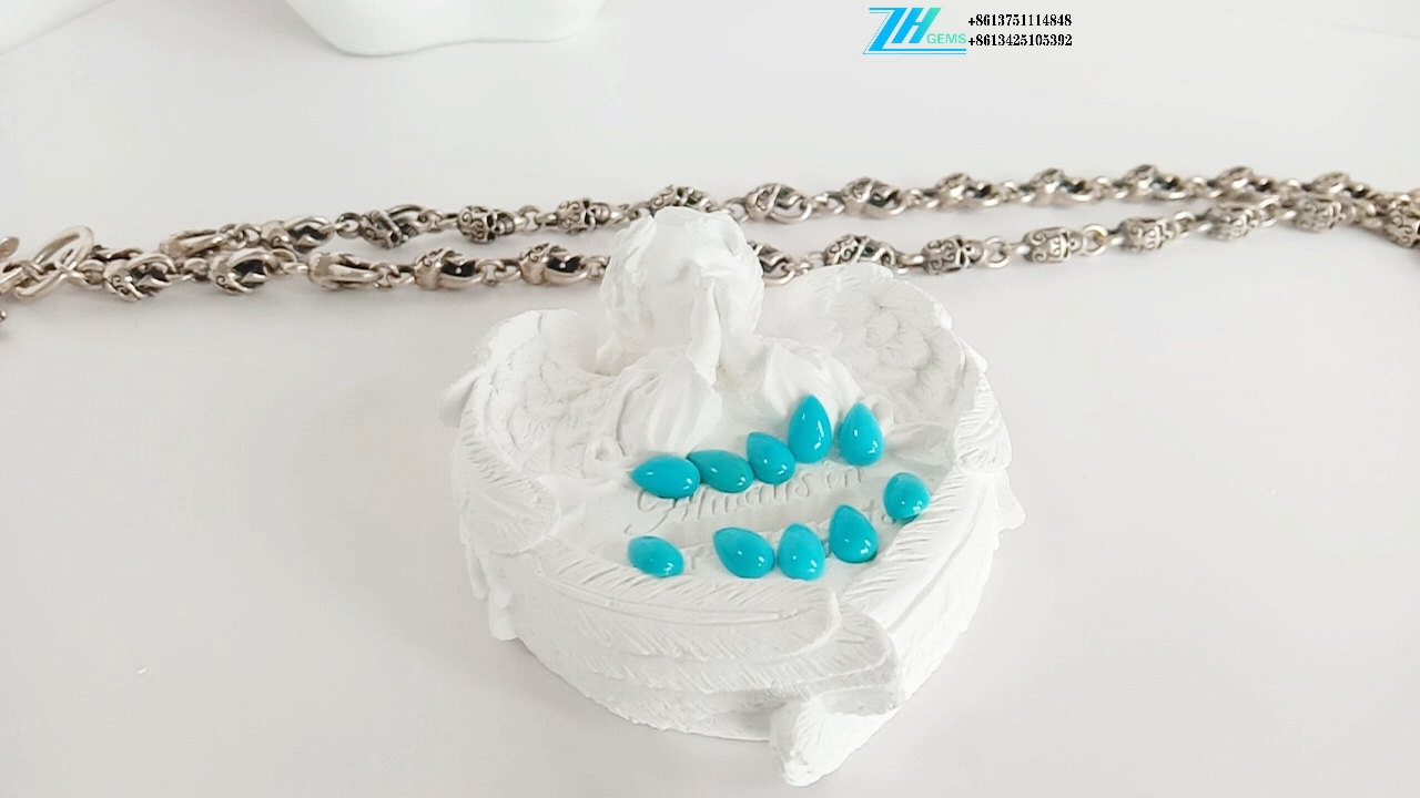เทอร์ควอยซ์ธรรมชาติ 12*8 มม. ลูกแพร์รูปร่าง Cabochon 9