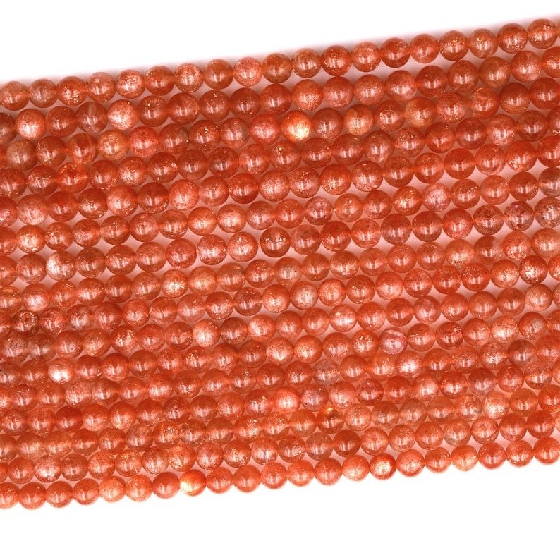 تەبىئىي قۇياش تېشى يۇمىلاق مونچاق Feldspar ئالتۇن پارقىراق ئاپېلسىن قىزىل گۆھەر تاش 9