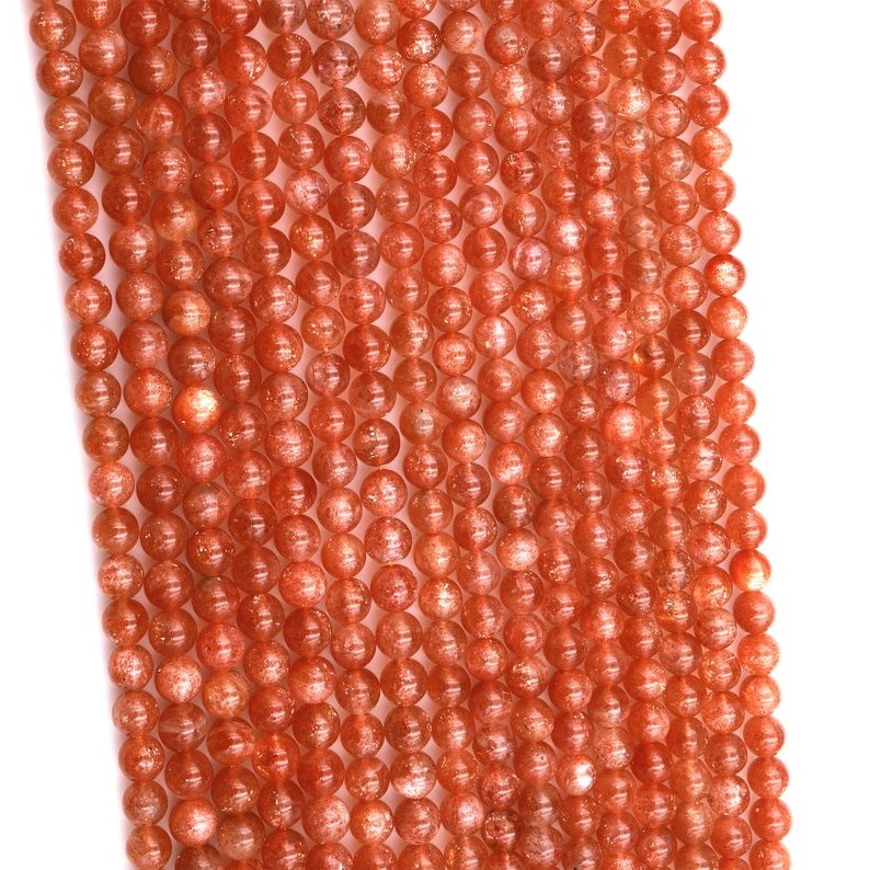 تەبىئىي قۇياش تېشى يۇمىلاق مونچاق Feldspar ئالتۇن پارقىراق ئاپېلسىن قىزىل گۆھەر تاش 13