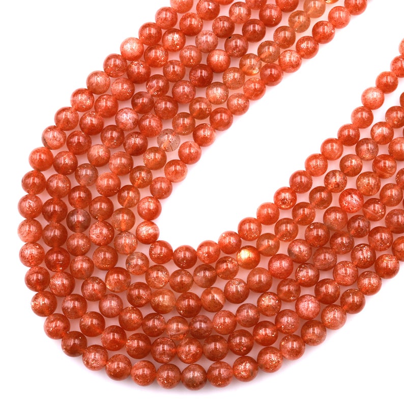 تەبىئىي قۇياش تېشى يۇمىلاق مونچاق Feldspar ئالتۇن پارقىراق ئاپېلسىن قىزىل گۆھەر تاش 15