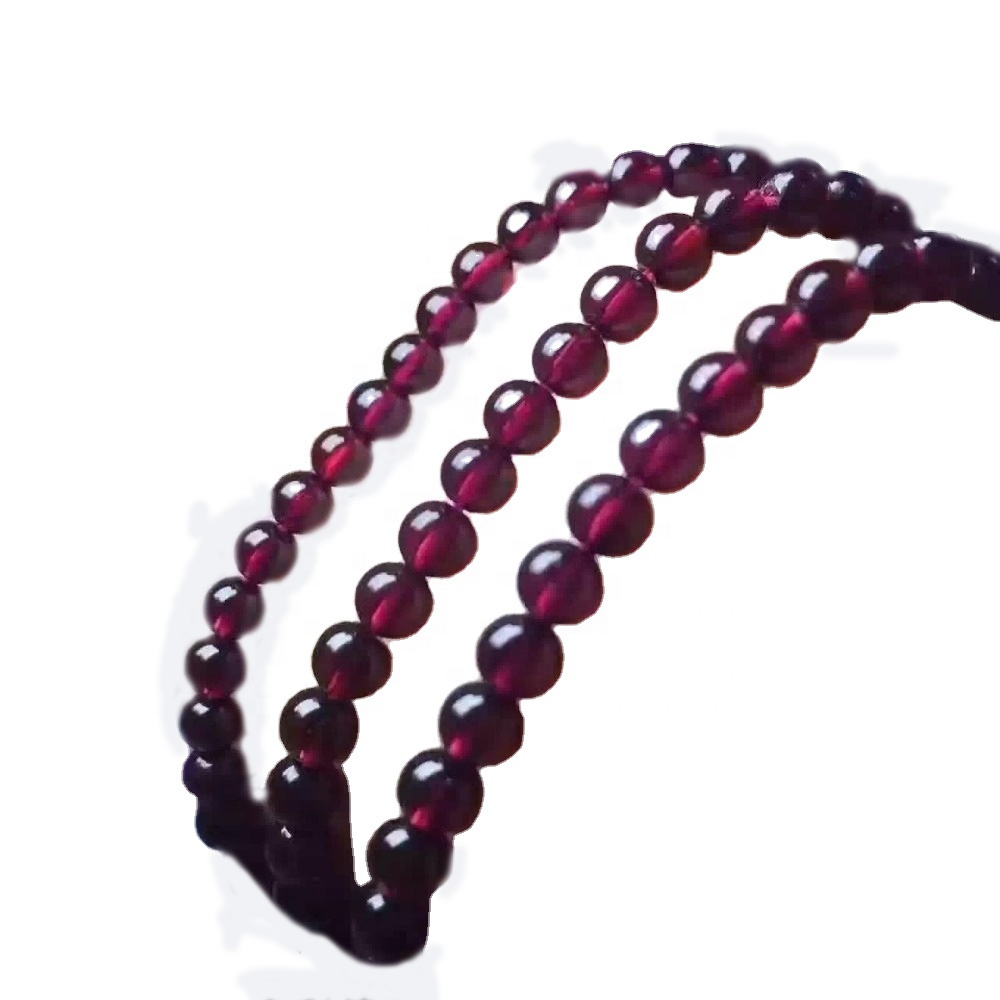 Perles rodones naturals per a la joieria fent un granat de pedres precioses soltes 30