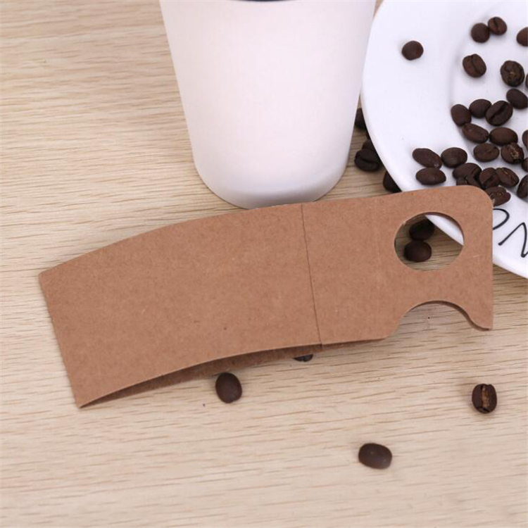 Disposable corrugated cardboard cup sleeve with handle