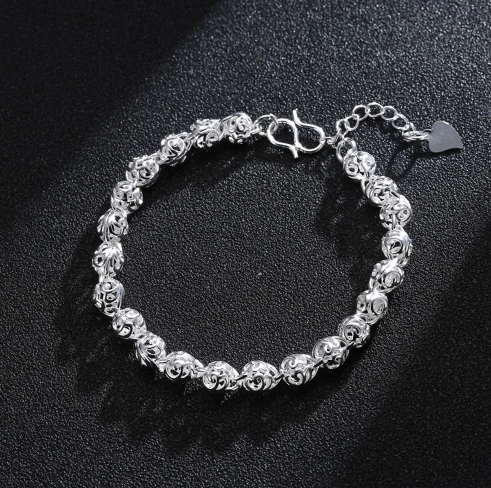 Hainon fashion Hollow Ball Bracelet Jewelry Wholesale Explosive Fashion Jewelry gift card flannel bag set 1