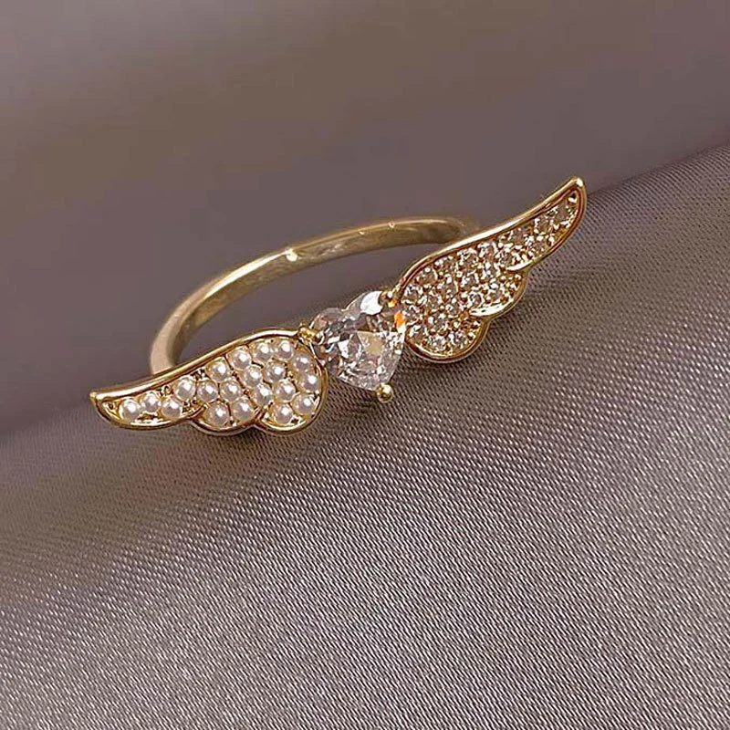Hainon Love micro inlaid zircon niche design wings fashion ring personalized index finger female ring 1