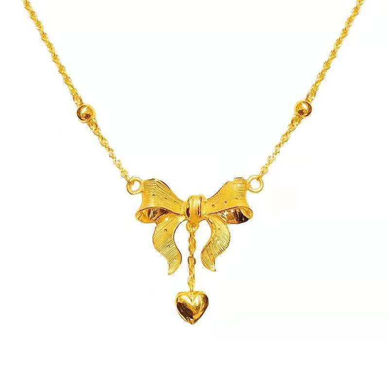 Hainon S925 Sterling Silver Gold clavicle chain explosion style love heart tassel Bowknot necklace women 1