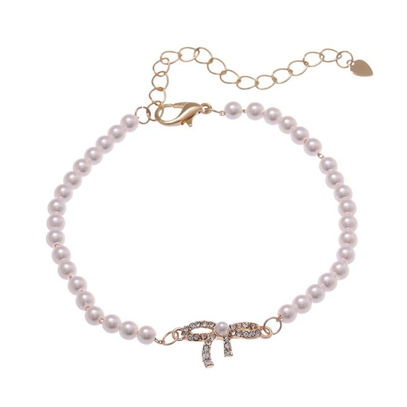 Hainon Fashion Cute Pearl Beads CZ Charm Bracelet Gold Plating Full Zirconia Bowknot Bracelet For Women Gifts Wholesale1 1