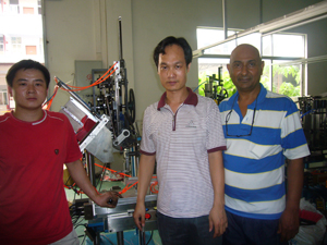 Mr Ji, Mr Cai and Tony, in Wanxinda's Workshop