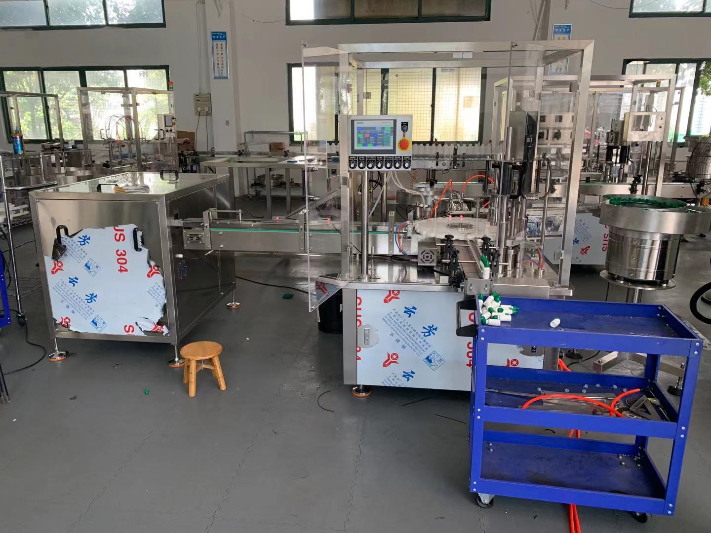 Vials filling and stoppering machine 11