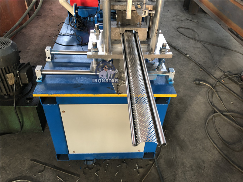IRONSTAR 80mm punching hole roller shutter door roll forming machine in Brazil 3