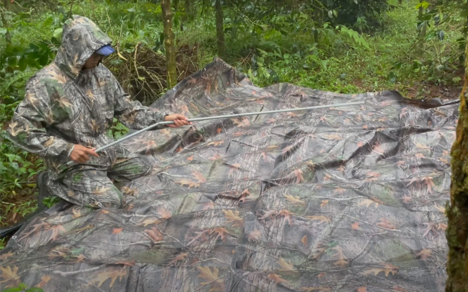 Essential Gear for Rainy Forest Campers - Camouflage Rain Suit 5