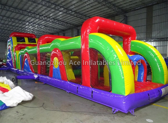 Carrera de obstáculos inflable arcoíris de 70 pies para carreras comerciales divertidas 1