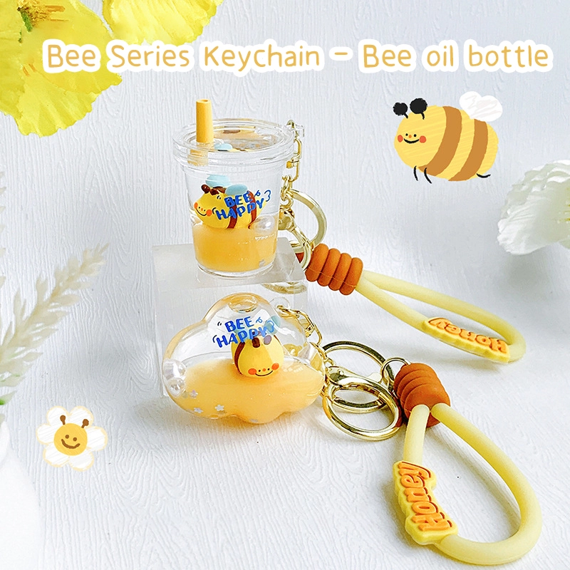 Cute cute bee into the oil floating keychain exquisite girls bag pendant car key chain wholesale 1