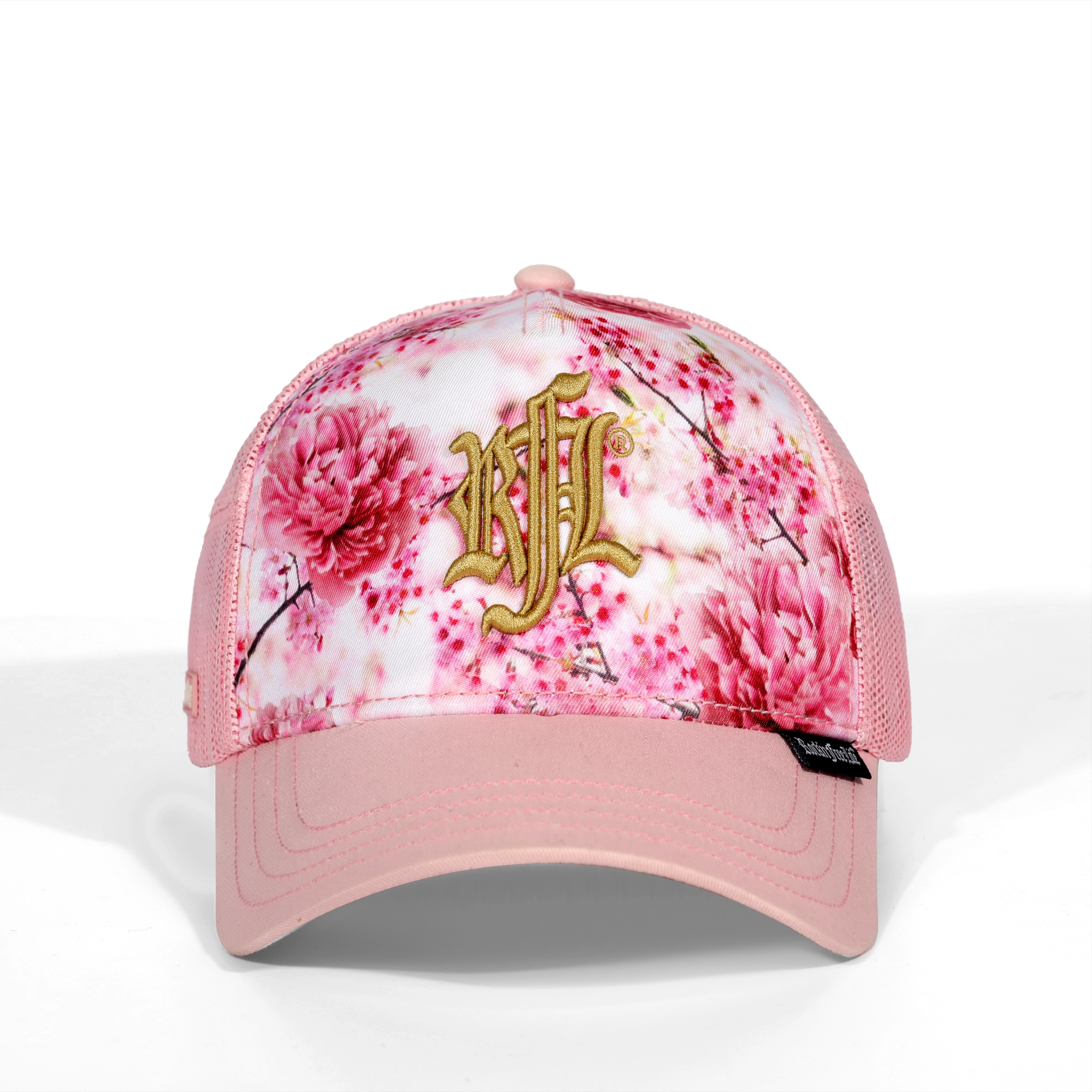 Gorra trucker con cinco paneles bordados en flor de cerezo rosa pálido 1