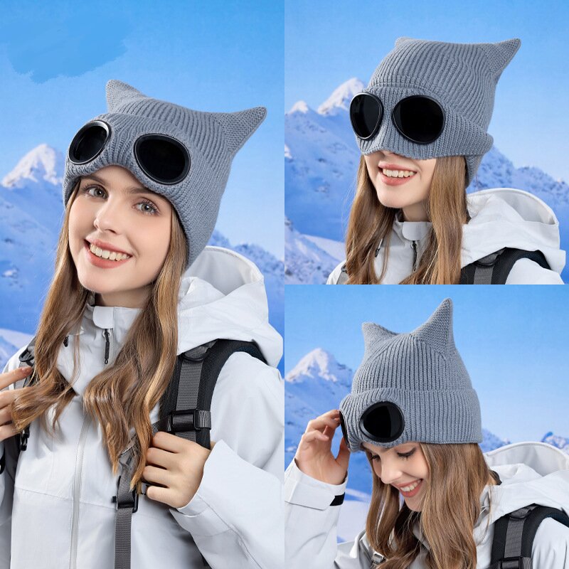 Three views of a woman wearing a gray cat ear knit hat with round dark lenses.