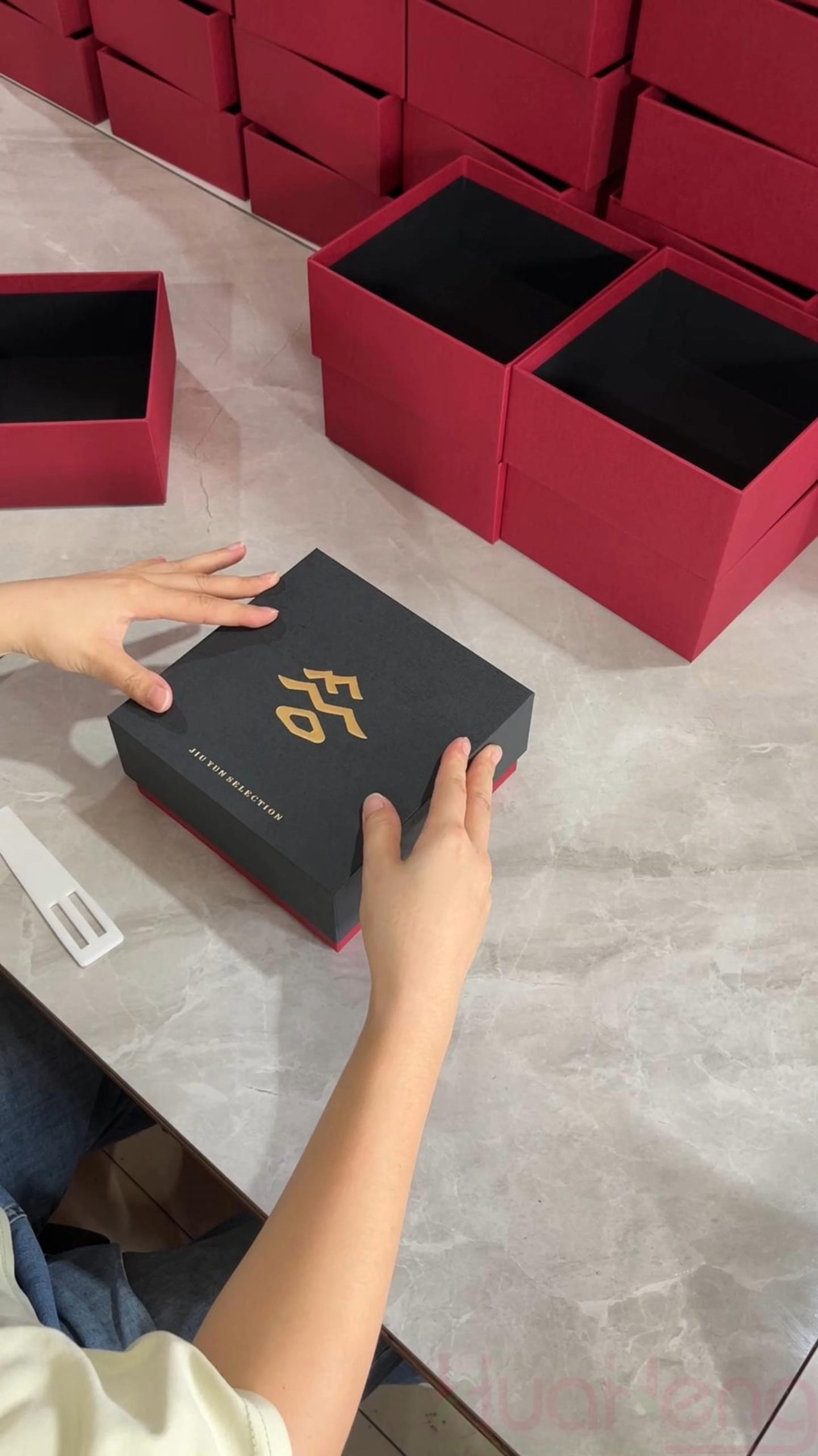 Elegant Protection: The Black and Red Two-Piece Lid & Base Box