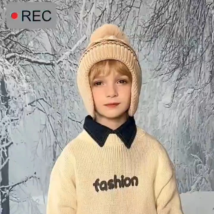 Set aus Wintermütze und Handschuhen für Kinder mit rautenförmigem Strickgarn 1