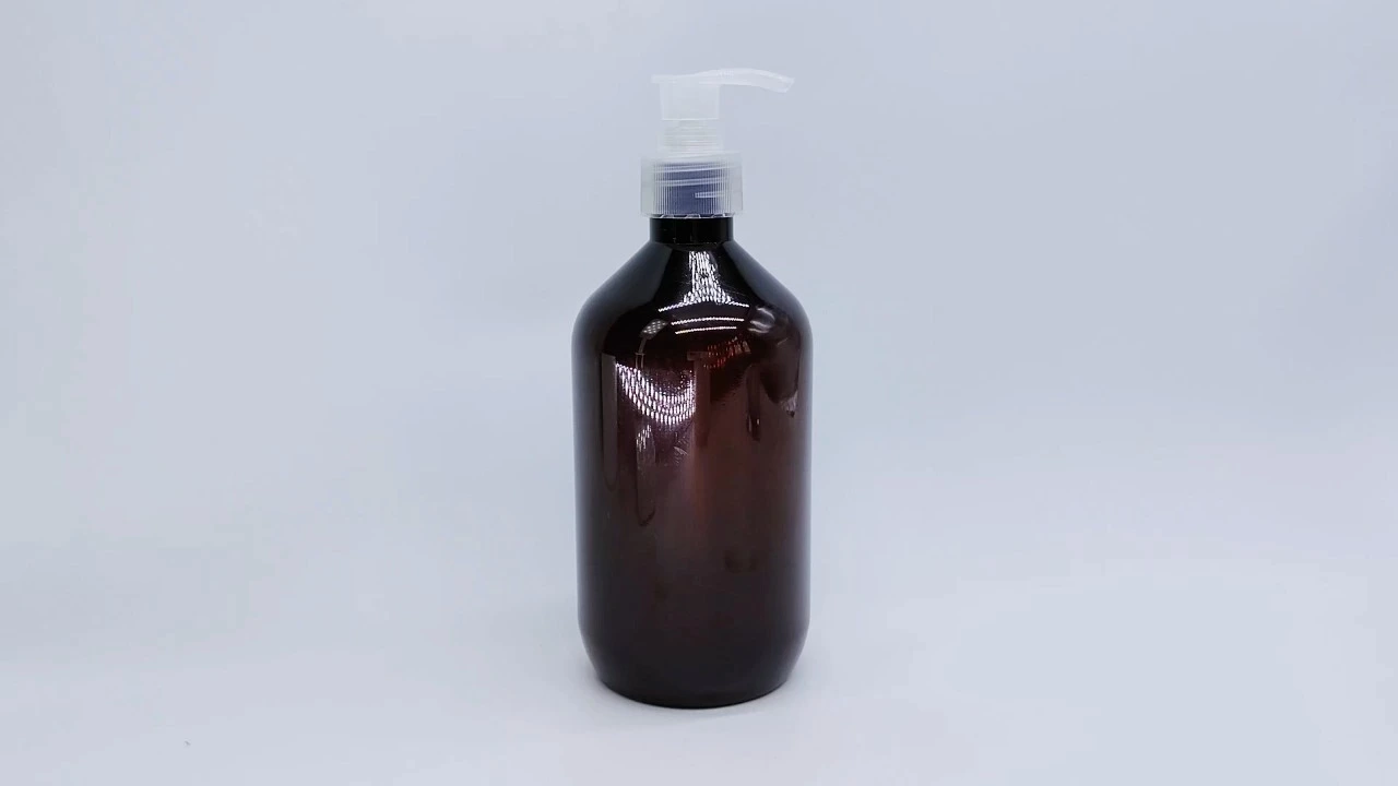 Glamorous 500ml brown translucent PET skincare packaging body lotion bottle. 1