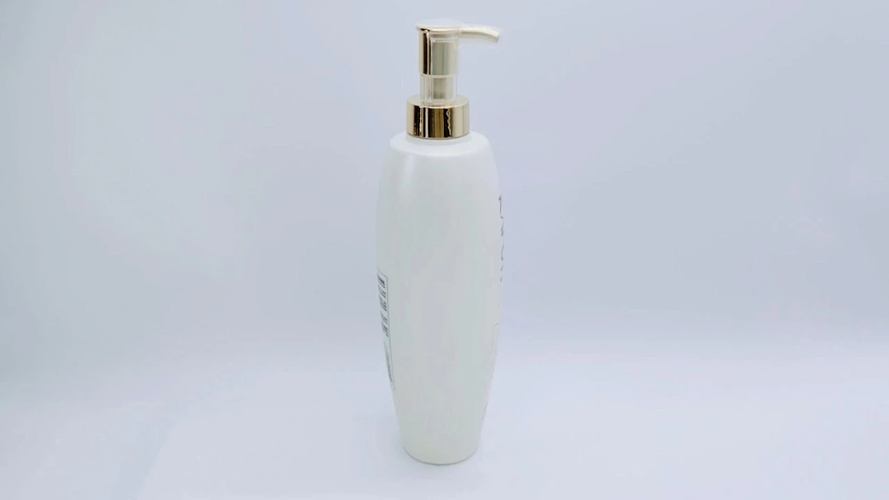 Glamorosa botella de loción corporal de PE/PET blanco perla de 800 ml para el cuidado de la piel. 1