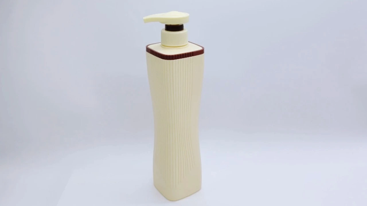 Botella glamurosa de loción corporal de PE/PET de 750 ml en color amarillo leche para envases de cuidado de la piel.1731137969062185 1