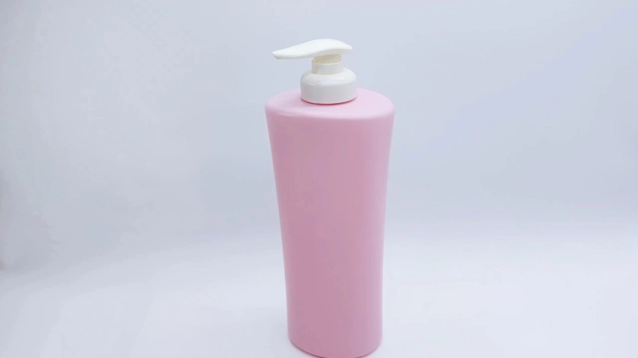 Glamorosa botella de loción corporal de PE/PET rosa de 960 ml para el cuidado de la piel. 1