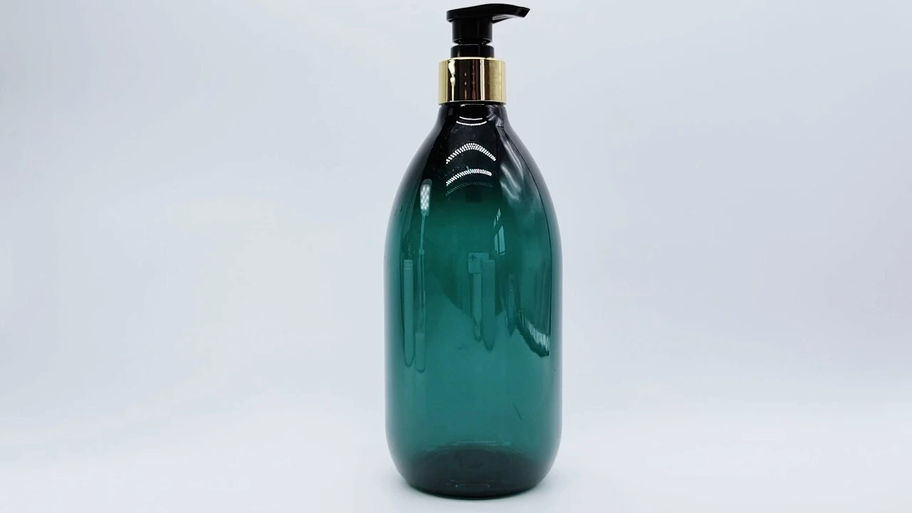 Glamorosa botella de loción corporal transparente de PET verde de 700 ml para el cuidado de la piel. 1
