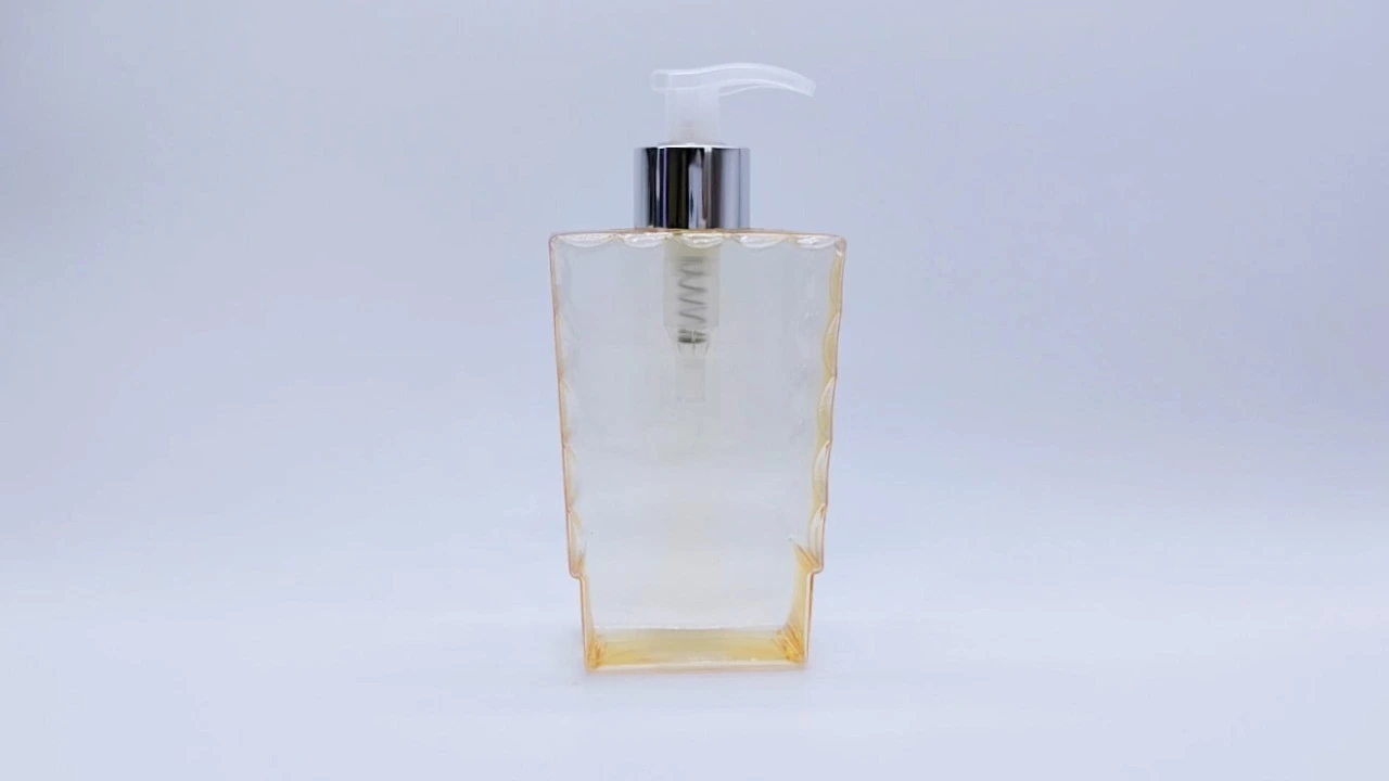 Glamorosa botella de loción corporal transparente de PET amarilla de 300 ml para el cuidado de la piel. 1