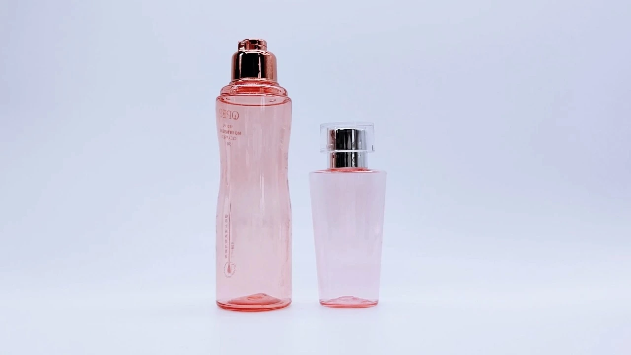 Botella de loción corporal transparente de color rosa glamoroso para el cuidado de la piel. 1