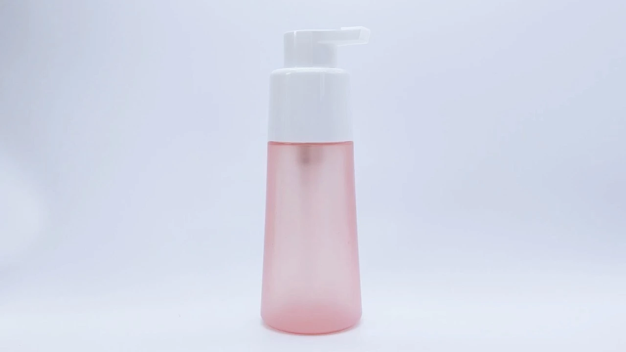 Envase glamuroso de PET transparente de dos compartimentos para el cuidado de la piel, de 400 ml, en color rosa esmerilado. 1