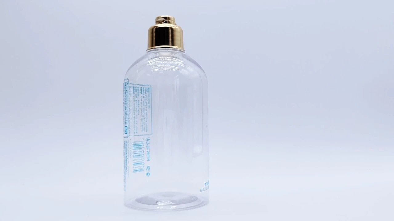 Glamorosa botella de loción corporal de PET transparente de 300 ml para el cuidado de la piel. 1