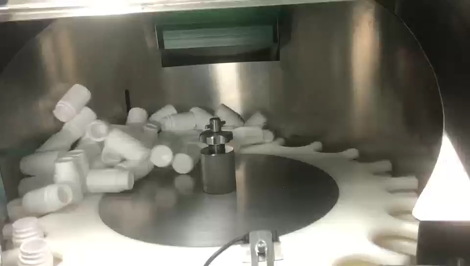 Linha automática de enchimento e contagem de frascos de medicamentos 1
