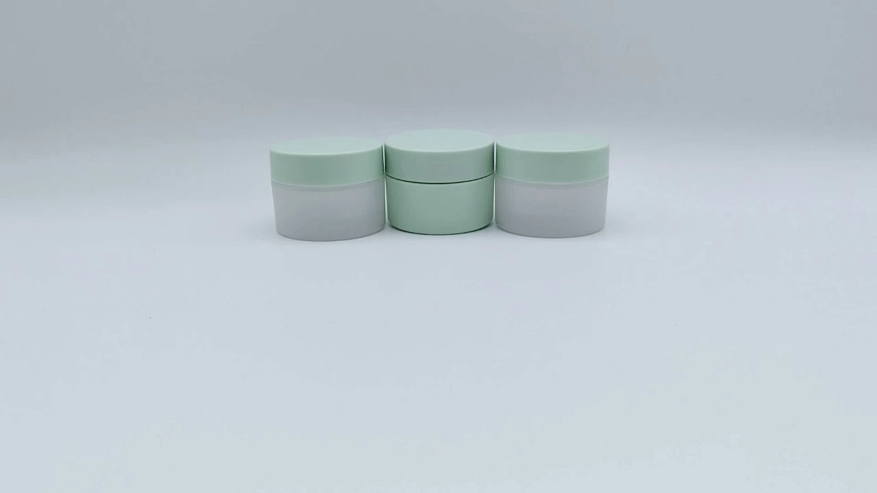 Glamorous 25g cylindrical double-wall white/green PP cream jars 1