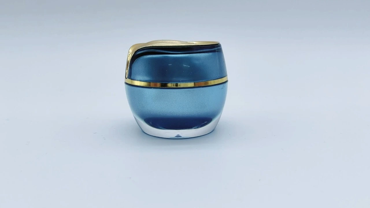 Glamorosos frascos de crema de lujo de acrílico azul de doble pared de 10 g con tapas con revestimiento dorado. 1