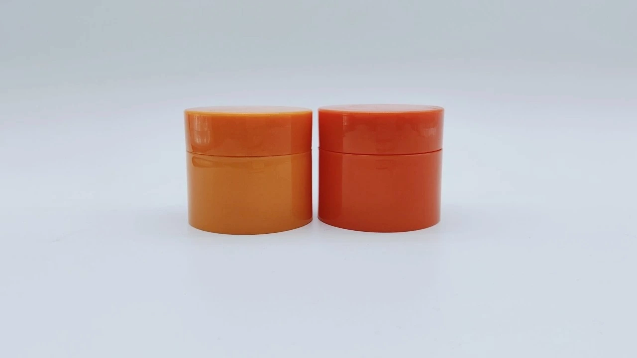 Glamoroso frasco de crema PEY naranja/rojo de 100 g con cuchara cosmética para el cuidado de la piel 1