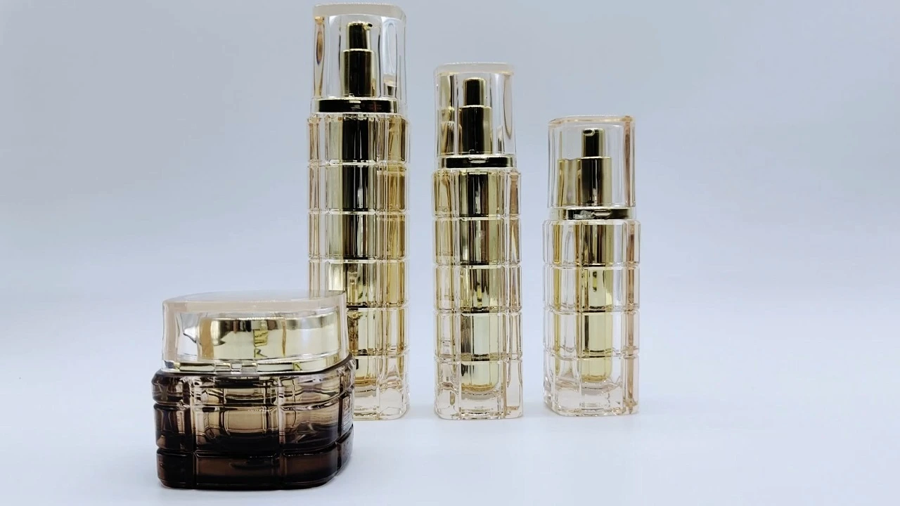 Glamorous luxury transparent gradient brown and gold acrylic cream bottles and jars set 1