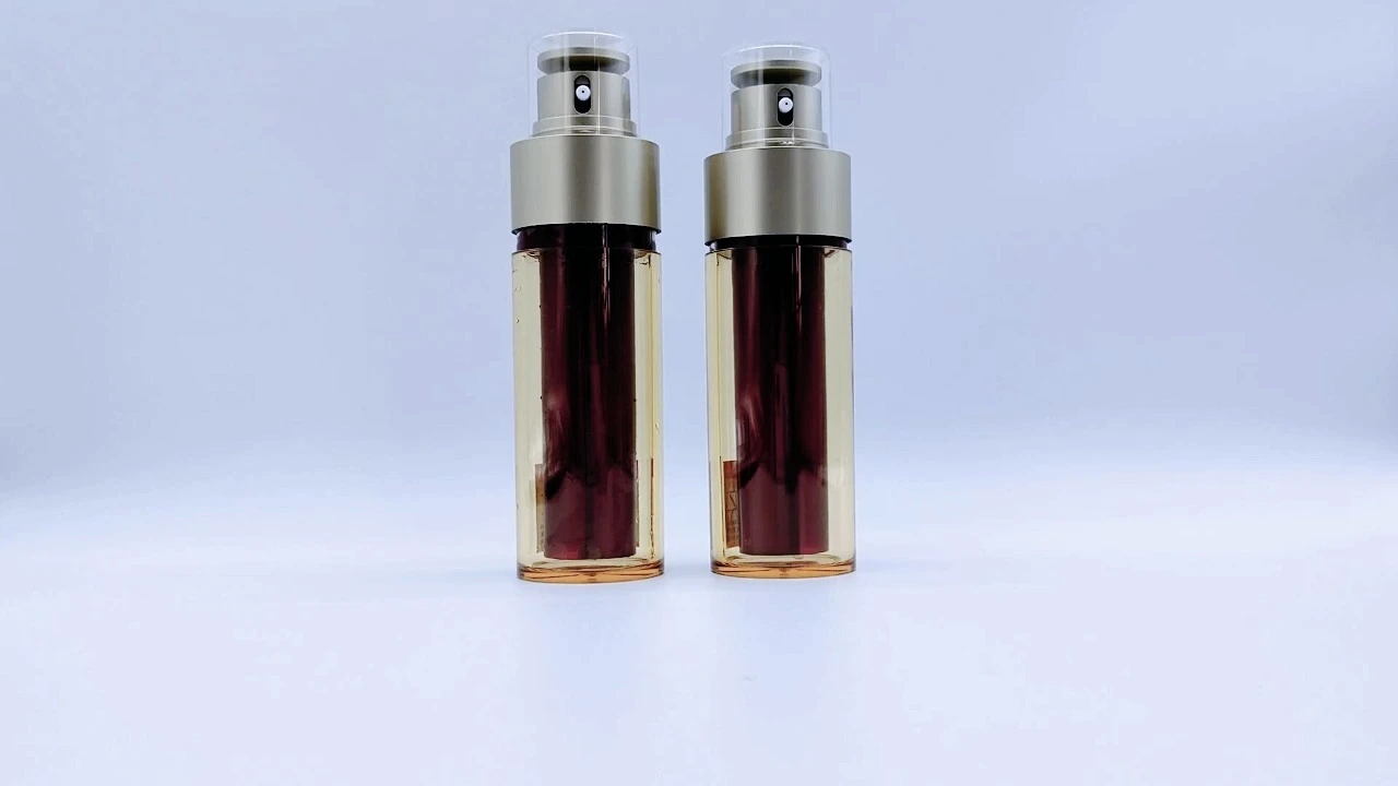 Glamorous 100ml Yellow and deep red acrylic lotion bottles with dual tube nozzle 1