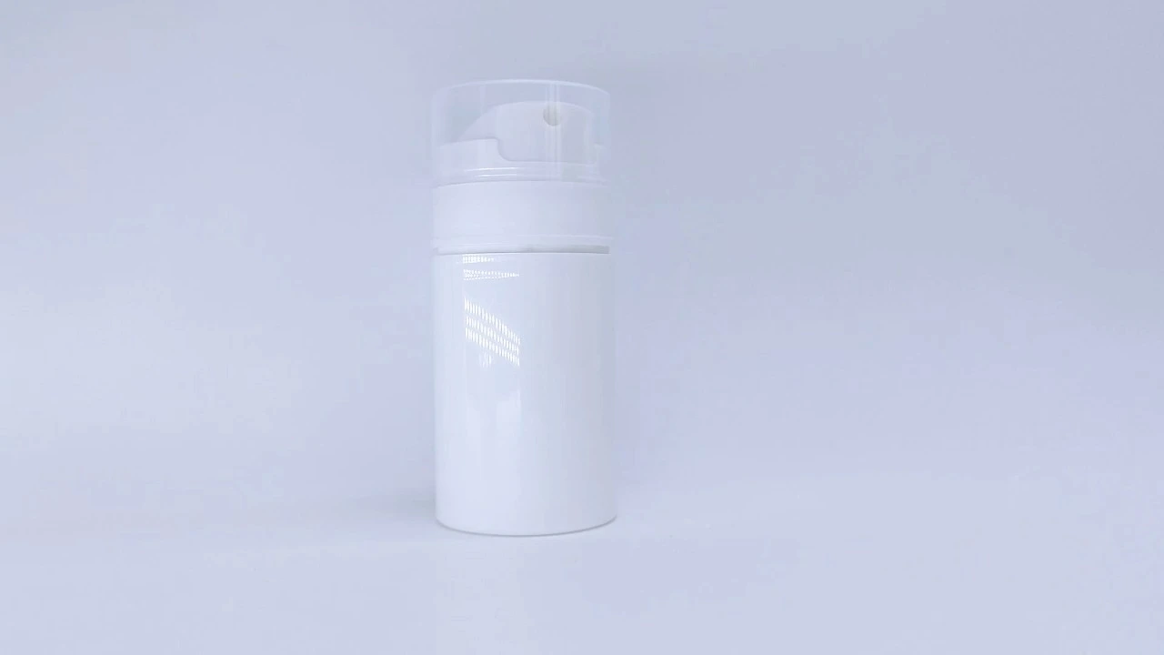 Glamorosas botellas airless de plástico blanco de 70 ml con bomba de loción y tapas 1
