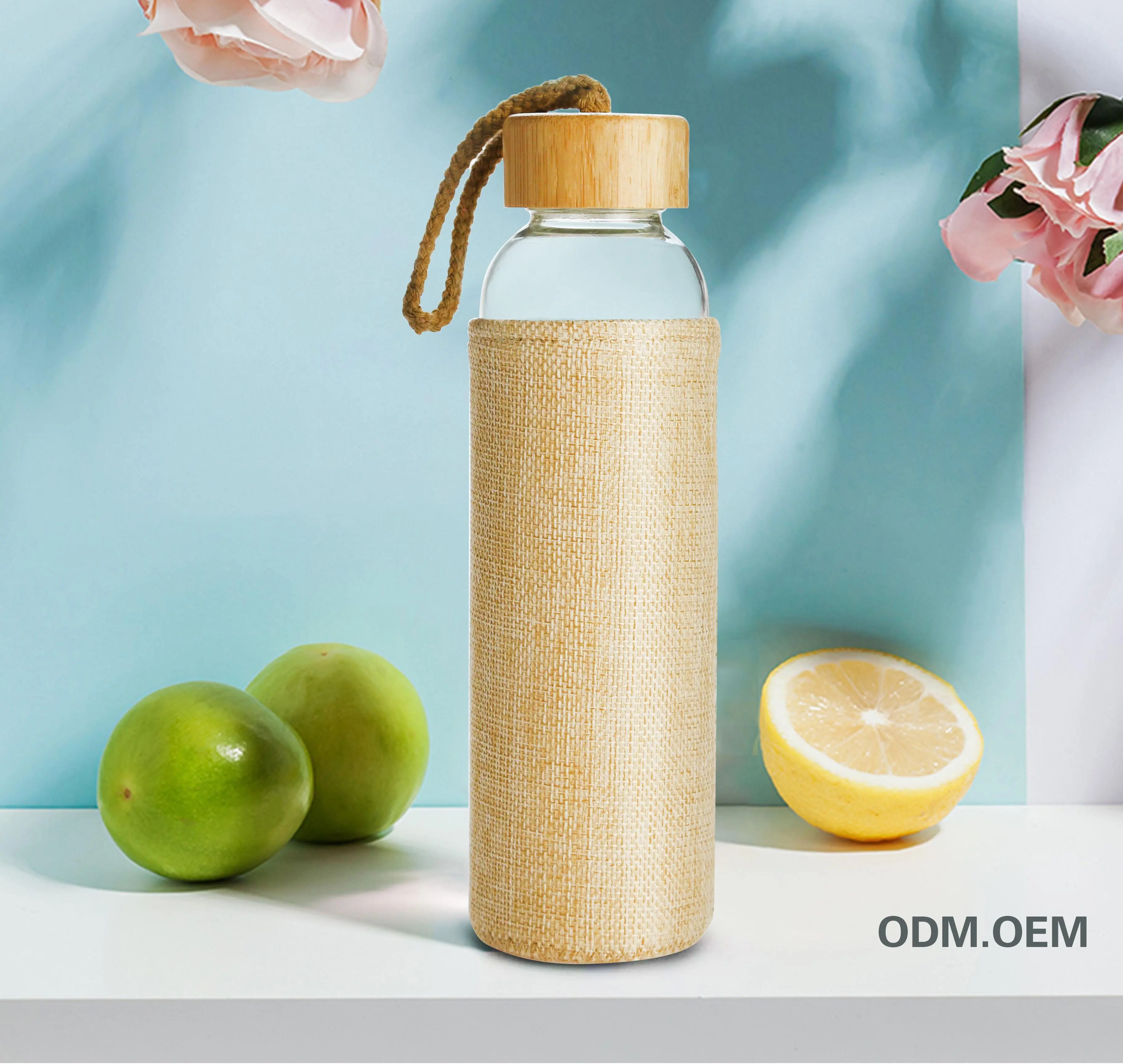 Borosilicate Glass Water Bottle na may Bamboo Lid at Jute Sleeve Reusable BPA Free Glass Drinking Bottle na may Lid 1
