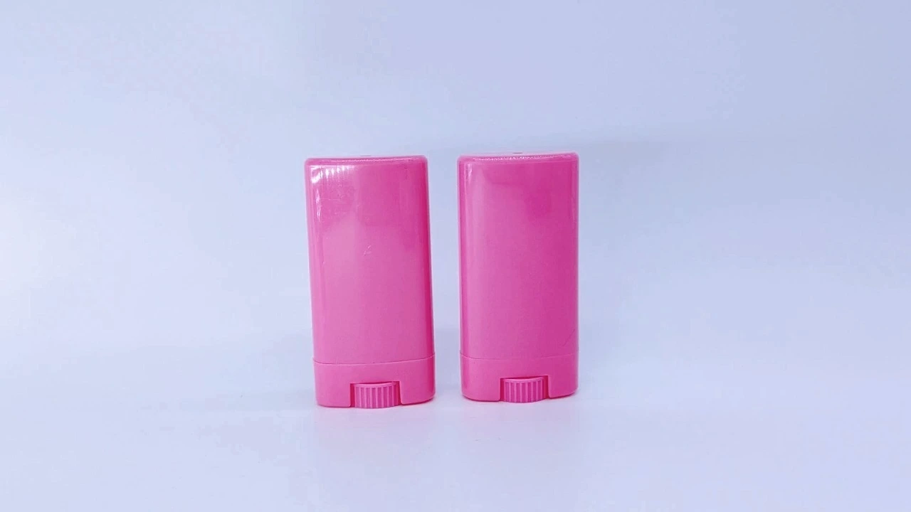 Desodorante en barra con bloqueador solar de plástico rosa glamuroso de 15 g, envase ovalado y plano, en roll-on. 1
