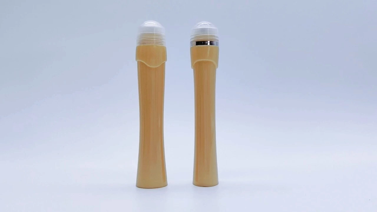 Glamorous 10ml Tan plastic skin care essential oil bottle with a three-headed steel ball roller 1