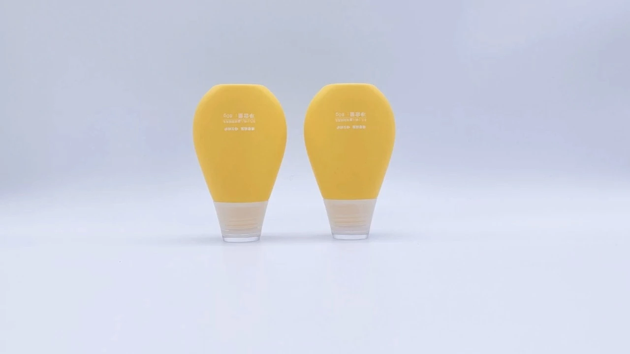 Glamorosas botellas de plástico naranja de 90 ml para loción y protector solar. 1