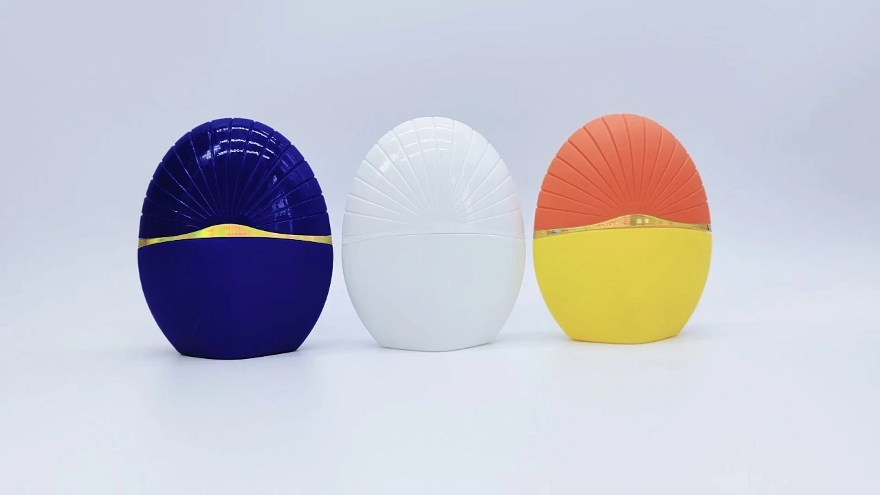 Glamorosos frascos de plástico con forma de sol de 40 ml en azul, blanco y naranja para loción y protector solar. 1
