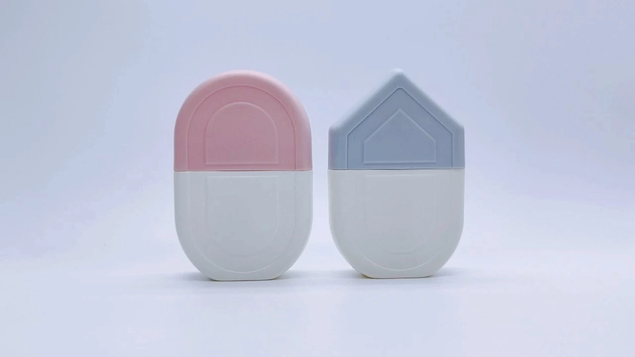 Glamorosas botellas de loción exprimibles de PE rosa/azul de 50 ml, frasco de protector solar 1