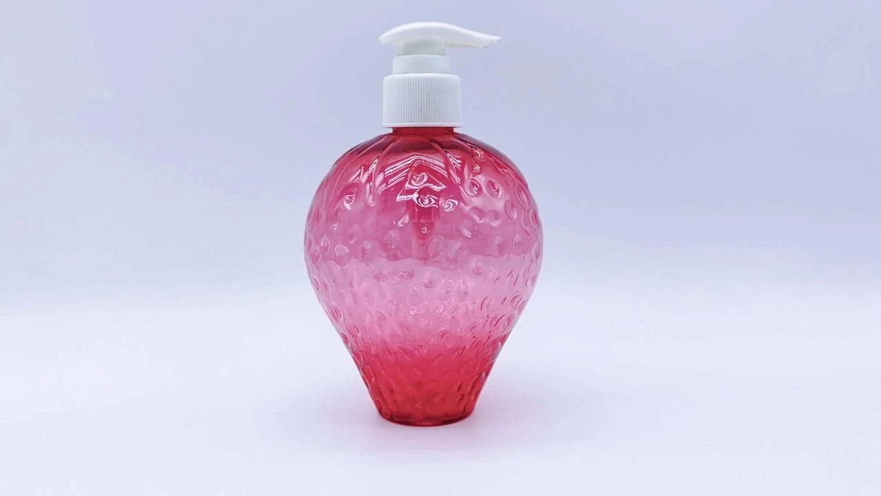 Glamouröse 350 ml rote transparente PET-Flasche in Erdbeerform für Hautpflegeverpackungen und Körperlotion 1