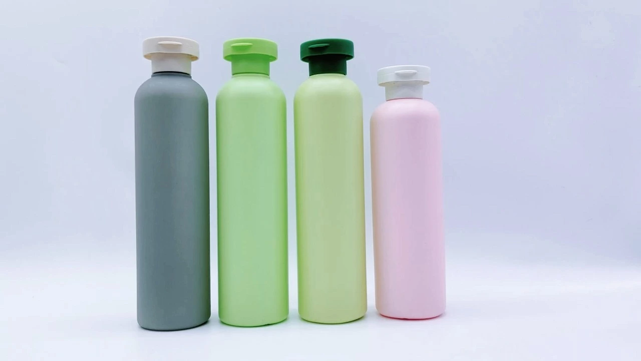 Botella de loción corporal glamurosa de 250 ml/260 ml con envase de PE para el cuidado de la piel en varios colores 1