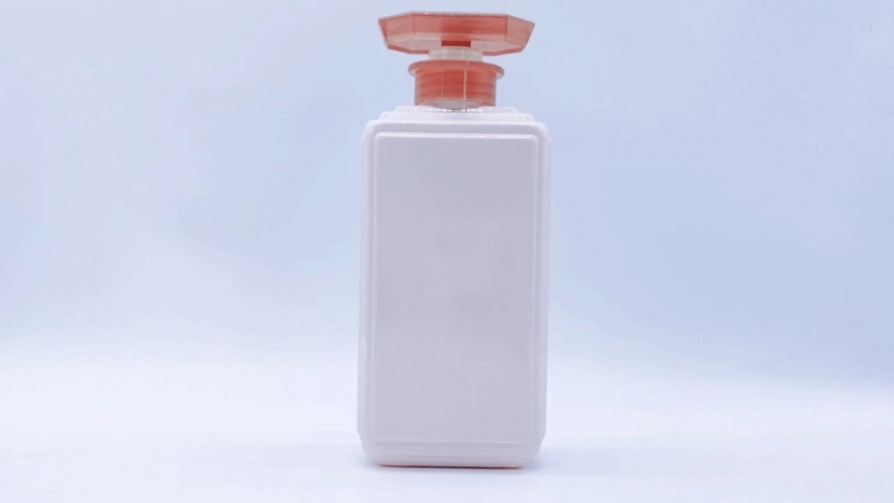 Glamorosa botella de loción corporal en envase de PE/PET rosa de 500 ml para el cuidado de la piel. 1