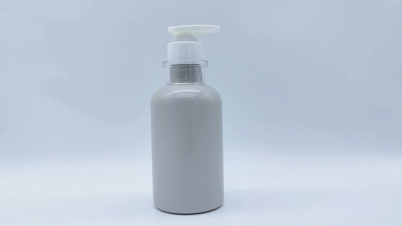 Glamorosa botella de loción corporal de 300 ml en PET/PE gris para el cuidado de la piel. 1