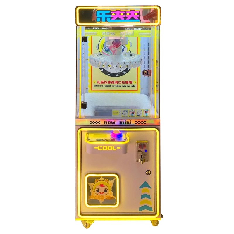 Machine à cadeaux avec pince à pièces 1