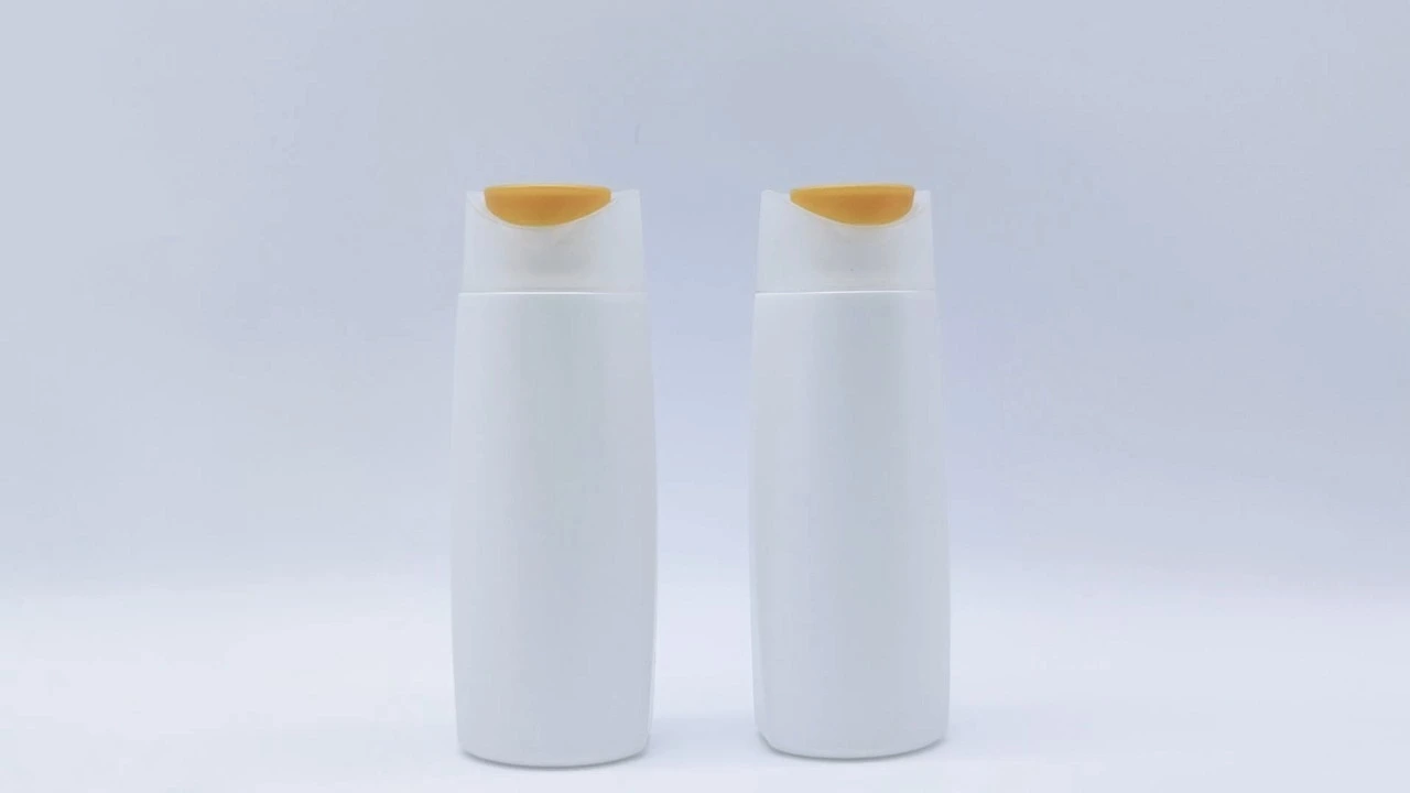 Botella glamurosa de champú y acondicionador de PE blanco de 80 ml para el cuidado de la piel. 1
