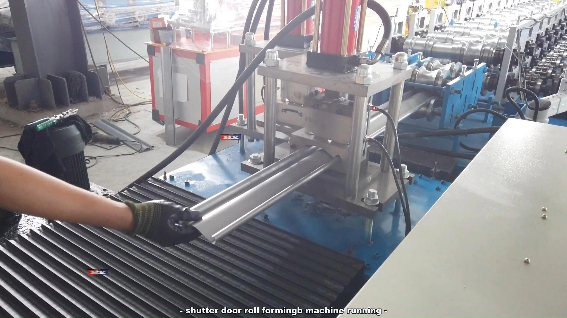 Double-head shutter door machine with punching 1